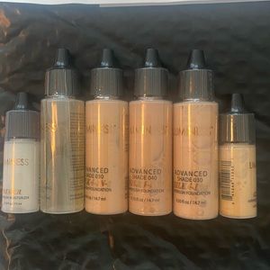 Breeze luminess foundation (2),highlighter, primer, cleaning solution. New